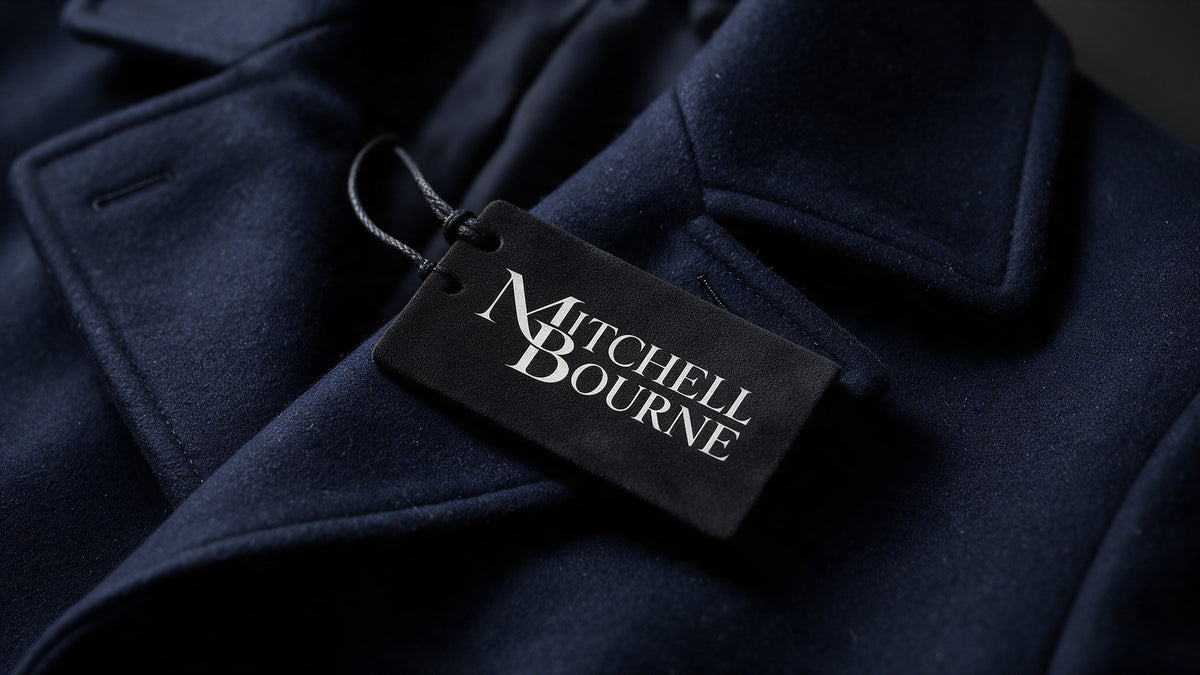 Mitchell Bourne label on a navy garment